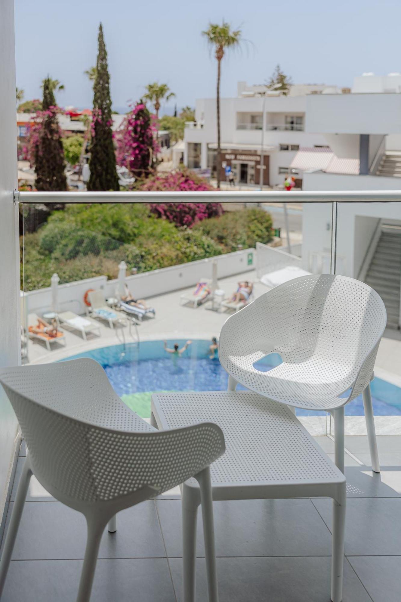Double or Twin Room Pool View,1699022717:JPEG